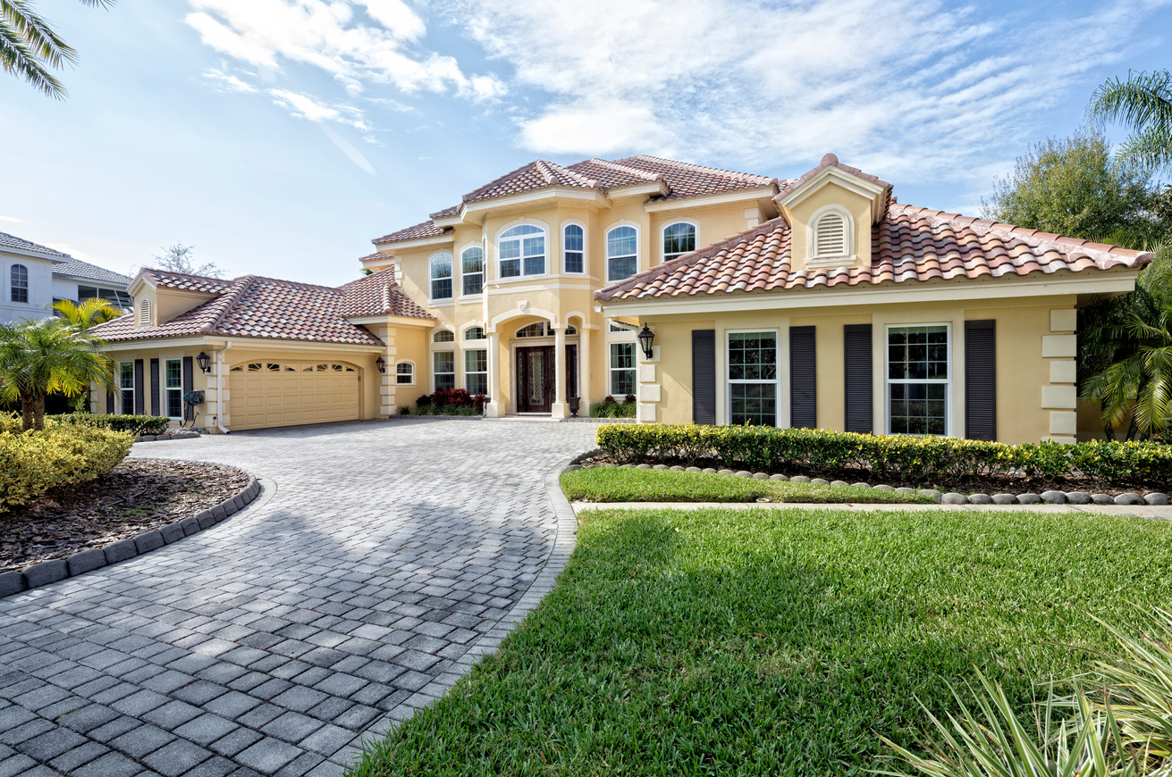 Exterior of Estate Home with Paver Driveway